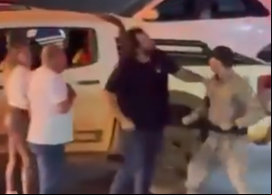 Motorista tenta bater em policial